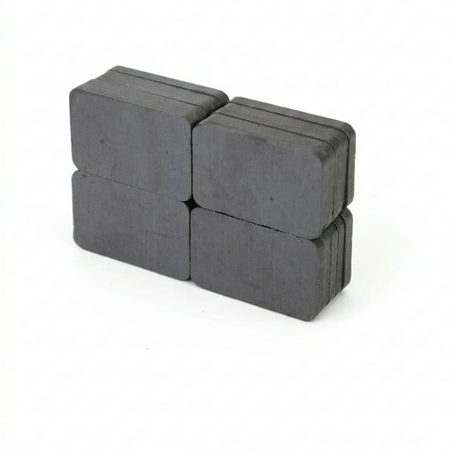 Thick ferrite bar magnets in block grouping for heavier-duty assembly use.